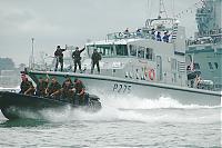 Click image for larger version

Name:	tn_Marines with P Boat 1a.jpg
Views:	525
Size:	81.1 KB
ID:	13106