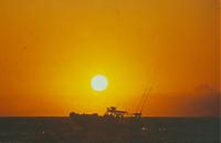 Click image for larger version

Name:	sunset off Honolulu.jpg
Views:	603
Size:	16.2 KB
ID:	17274