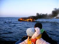 Click image for larger version

Name:	Boat on Fire 2.jpg
Views:	989
Size:	112.5 KB
ID:	18718