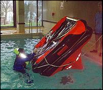 Click image for larger version

Name:	righting liferaft.jpg
Views:	365
Size:	93.9 KB
ID:	34169