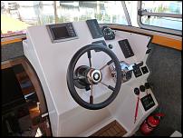 Click image for larger version

Name:	Helmsman's console.jpg
Views:	497
Size:	116.2 KB
ID:	94057