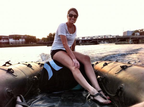 Steph piloting the boat.