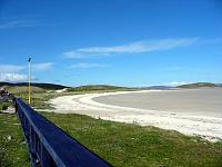 Barra Isle Airport, this believe it or not, is the runway! 
Planes only land at low tide. 
The "terminal building" is 20 yds. away on your...
