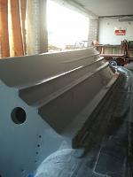 First view of the re-gelled and polished hull. You can now see a shine and reflection!