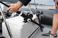 Multi-purpose rear bench. Live bait well & rod holders with detachable cushion