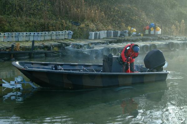 1st trials of the Mk1 Rigid Raider replacement engines. Suzuki 140's off Mariner 115 optimax took its place. Note the line up of old fuel tanks full of sand 25kg each for weight testing. December 2005