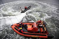 The Parker rib on swell generation duty as climbers train for boarding "things" at sea.