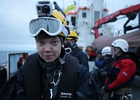 Sini looking pensive. All wired up and ready to defend her Native Arctic heritage ....by rib of course