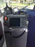Navigator's station.  Note Command mic, SPOT transmitter, and finger mouse to remotely control Furuno NavNet 3D system.