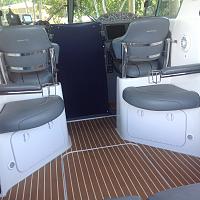 Rear facing seating with custom arm braces