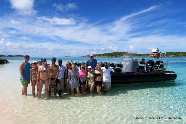 Feeding the Iguanas in Allens Cay, Exuma, Bahamas