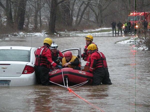 Avon ERB-310 used to make a swift water rescue of a motorist stranded on a flooded roadway.