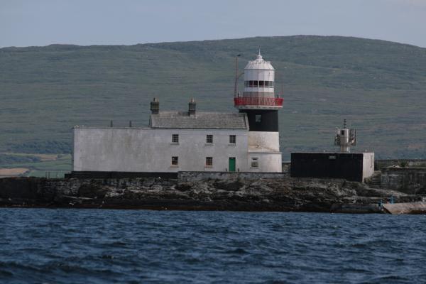 Roancarraig.The old lighthouse and the new Solar powered LED light tower complete with AIS, to the right- first in the country although quite a few were already solar powered, eg. Skellig since 2001.