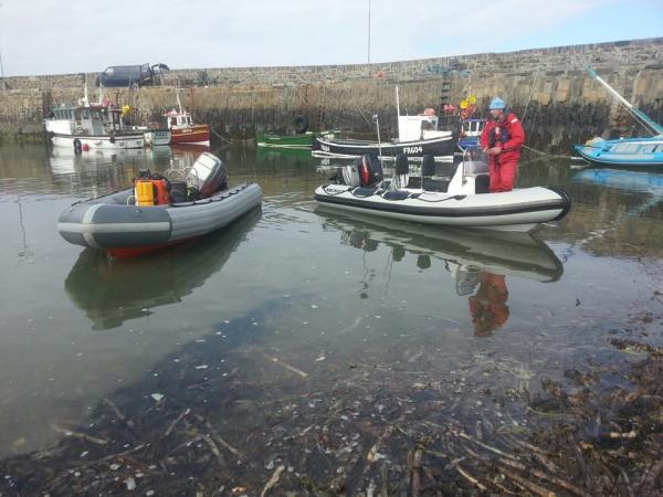 Sula (Ribcraft 4.8m) and a Searider 5.4m in Rosehearty harbour at low tide in seaweed stew!