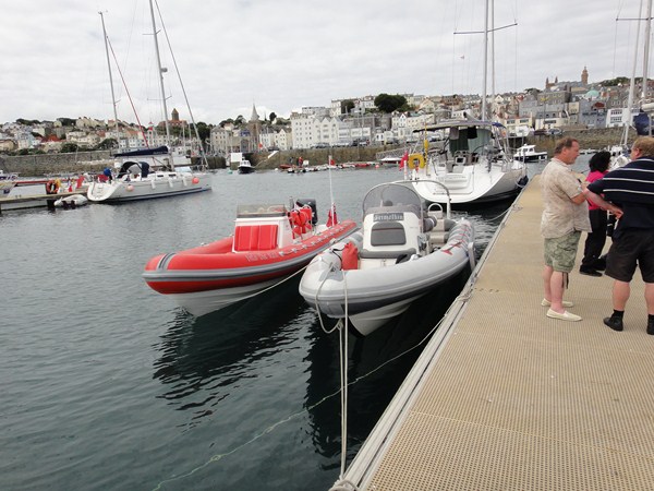 Into the Red next to Grimalkin (Avocet) on Guernsey, with Paul Cannell stood on the pontoon