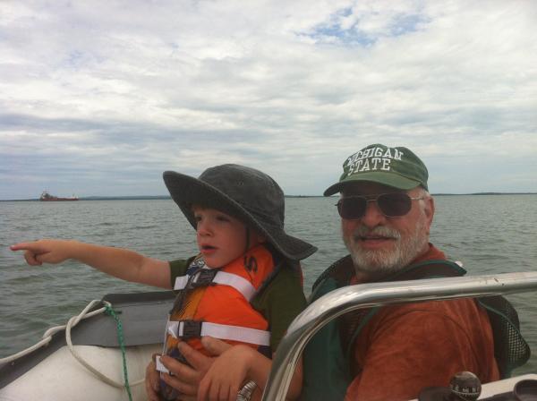 My son Finn and his Grandpa George on Lake Huron